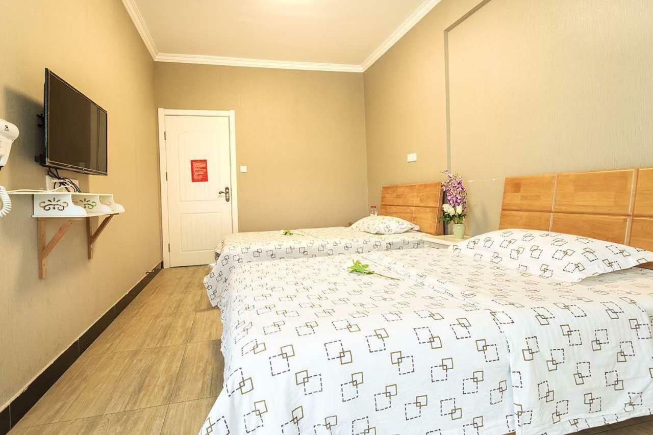 Huanlesong Youth Hostel อู่ฮั่น ภายนอก รูปภาพ
